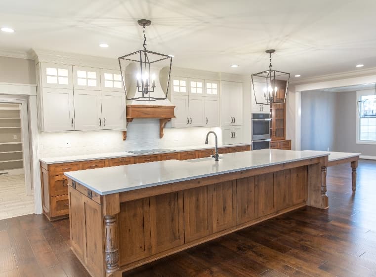 light white kitchen with custom wood cabinets